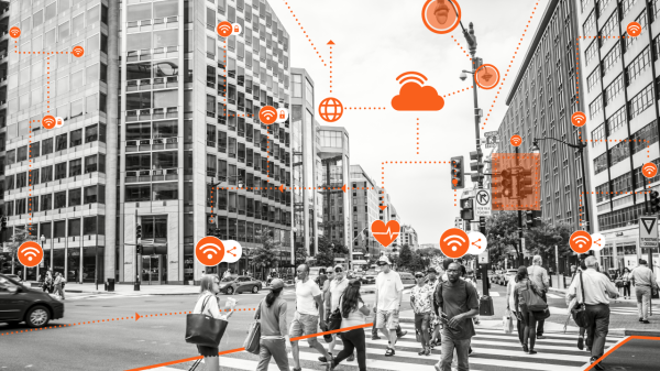 People crossing a city sidewalk. The caption reads: A new project at ASU, “Citizen Centered Smart Cities and Smart Living,” aims to take an interdisciplinary approach to understanding and developing smart cities with individual citizens at the forefront o