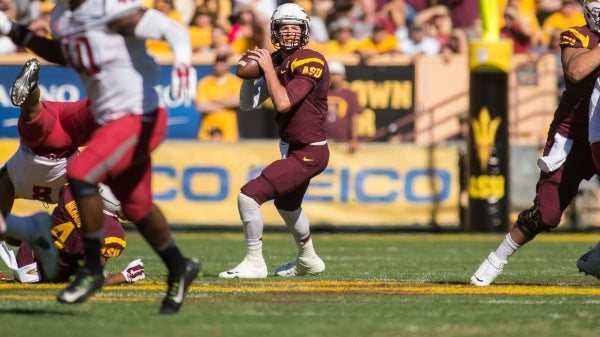 Quarterback Taylor Kelly playing in an ASU football game