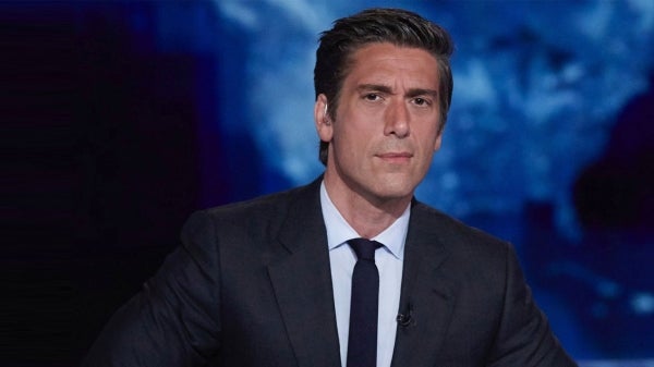 Portrait of news anchor David Muir.