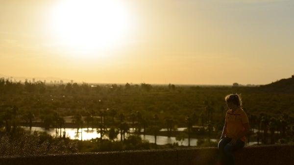 ASU student watching sunset