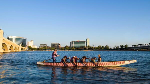 Phoenix Desert Dragons team rows on Tempe Town Lake