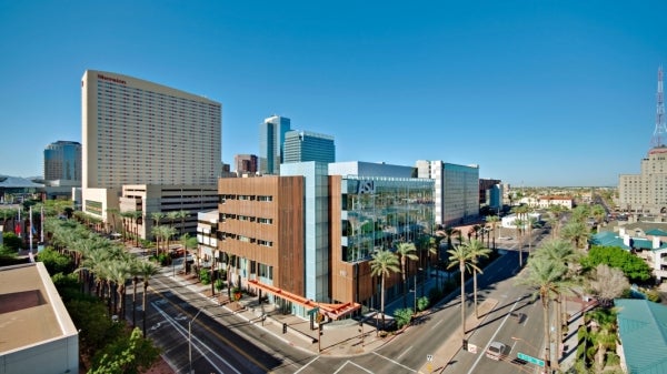 Aerial view of an intersection showing an ASU building in downtown Phoenix