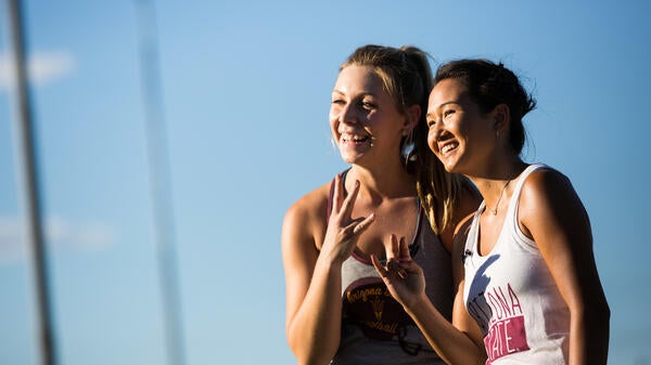 Twirlers pose for a photo at ASU marching band practice.