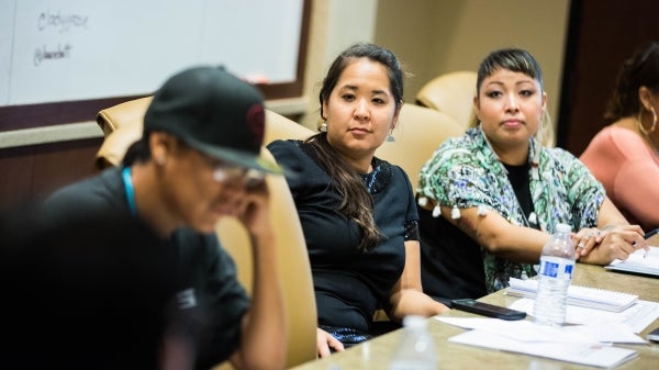 Native entrepreneurs listen during a seminar