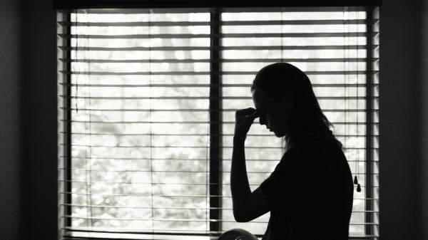 woman by window