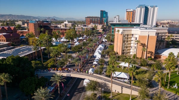 View of homecoming parade in downtown Tempe from a drone