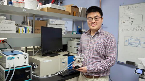 ASU assistant professor of chemical engineering Kailong Jin in a lab