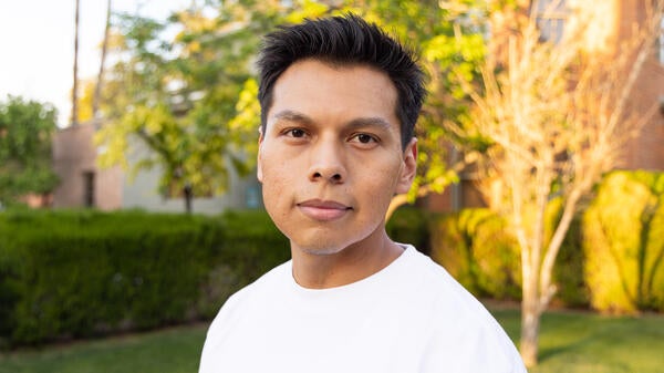 Headshot of ASU student Chris Hoshnic in an outdoor setting.