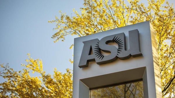 Photo of ASU sign with palo verde blooms in background