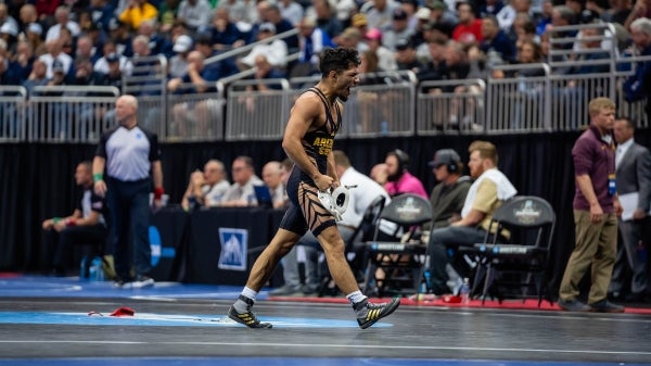 Richard Figueroa celebrates after a win at the 2024 NCAA Wrestling Championships in Kansas City, Missouri.