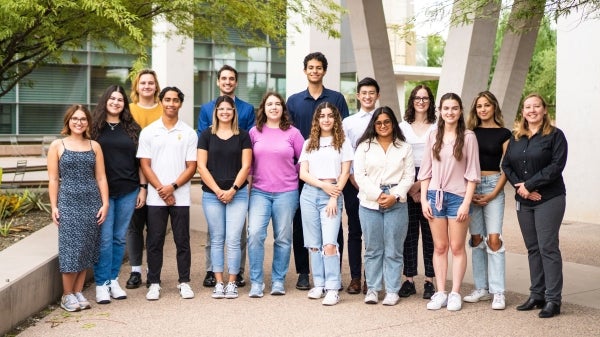 Jessica Verpeut stands with her graduate and undergraduate students.