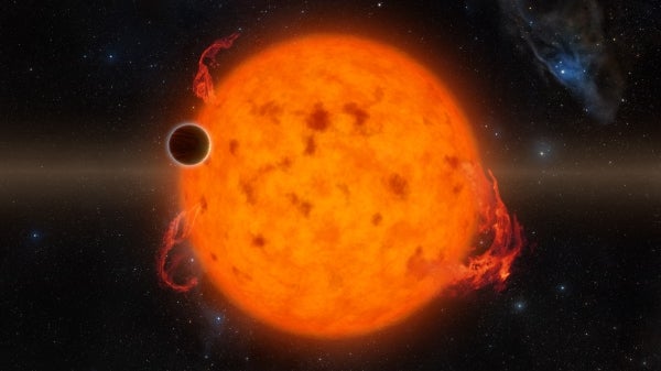 An artist’s conception of the exoplanet K2-33b, a 10 Myr Jupiter-sized planet, transiting in front of its active host star.