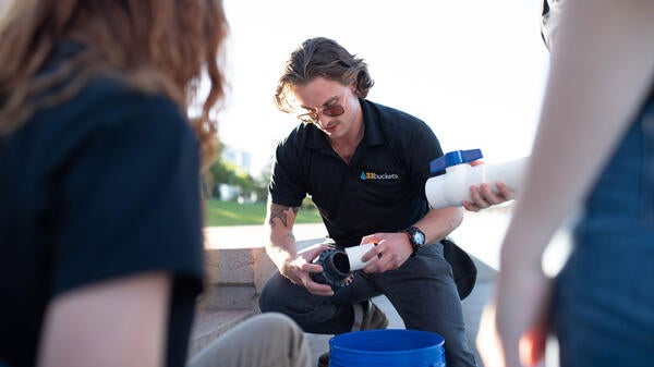 Man working with a water pipe