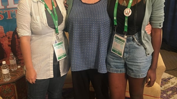 Anique Brito (left) poses with fellow student Trejon Dunkley (right) and a participant at the 2016 Sedona Film Festival.