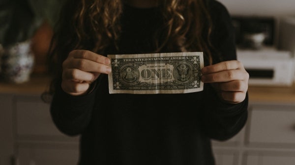 Girl holding dollar bill, money, girl, dollar,