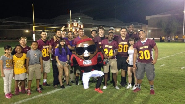 students on football field