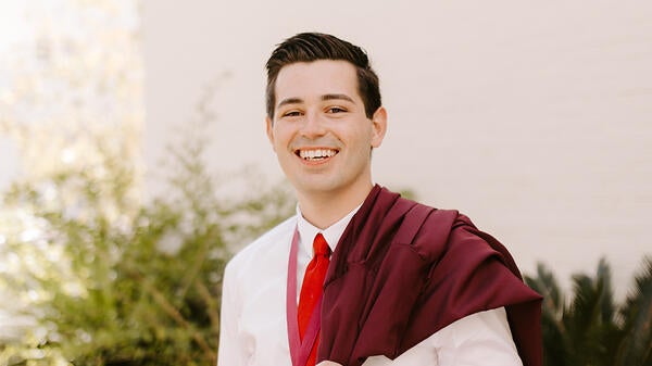 Portrait of ASU grad Alexander Almeida.