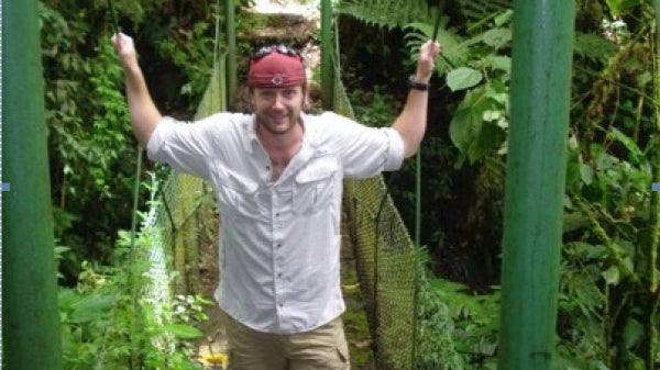 Ben Warner posing surrounded by greenery in Costa Rica