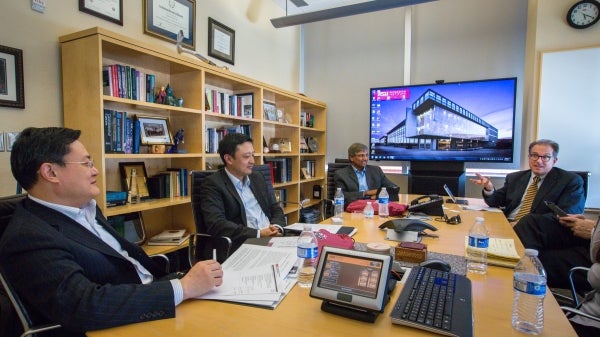 group of leaders meeting around table