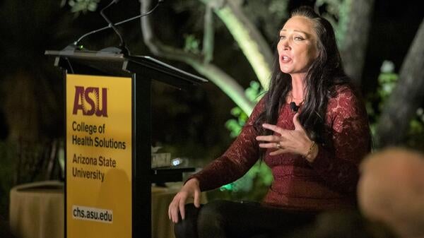 Amy Van Dyken-Rouen speaking to an audience at the ASU College of Health Solutions Celebration of Health event.