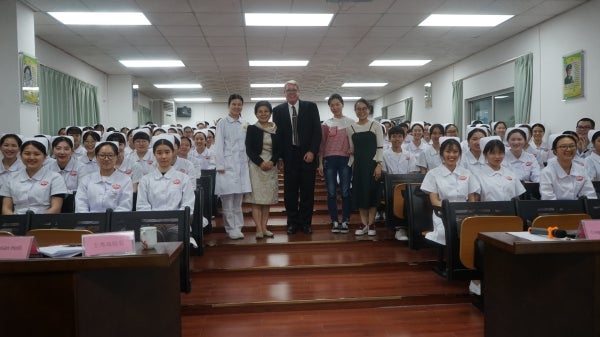 Edson College Sr. Associate Dean Craig Thatcher pictured with Dean Xiulan Wang (left) of the Nursing Program at Xinhua College at Sun Yat-sen University in Guangzhou, China. 