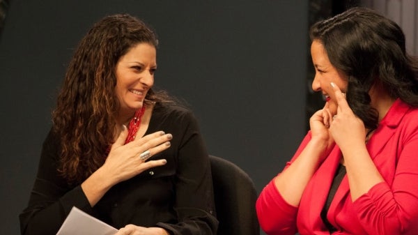 two women speaking sign language