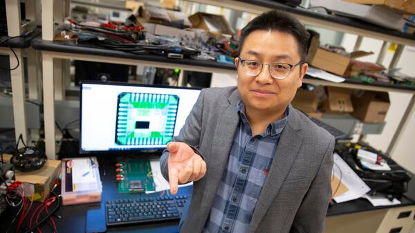 ASU electrical and computer engineer Deliang Fan in his lab.