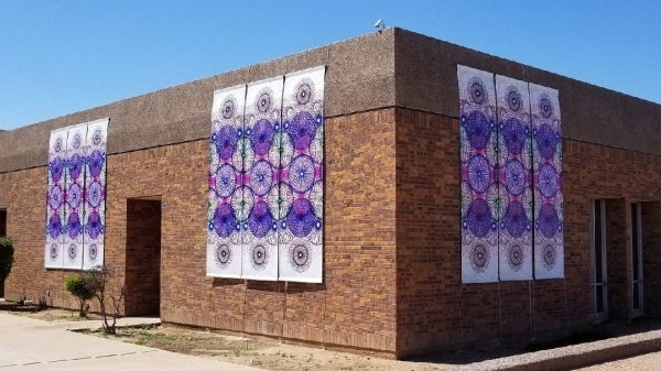 Photo of Kyllan Maney’s work on the exterior of the Edna Vihel Art Center