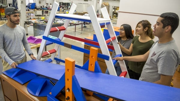 people building ladder