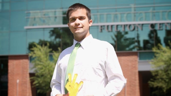 Eric Beeler holds his Pitchfork Award trophy