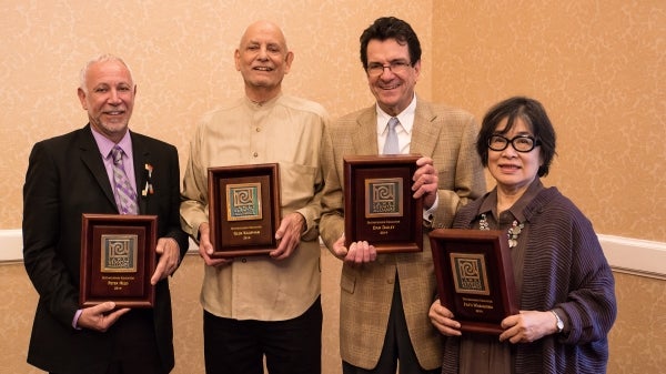 Peter Held (far left), ASU Art Museum curator of ceramics