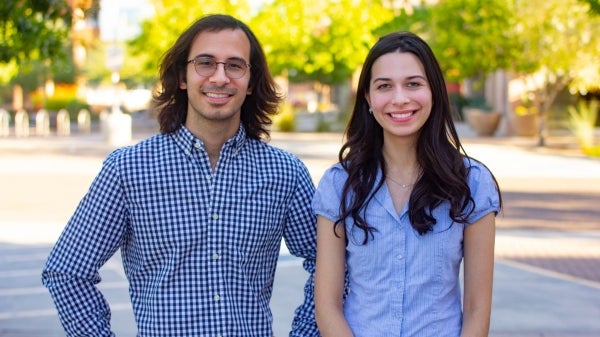 Man and woman smiling