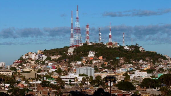 Transmission towers on a hilltop in Cabo San Lucas, Mexico