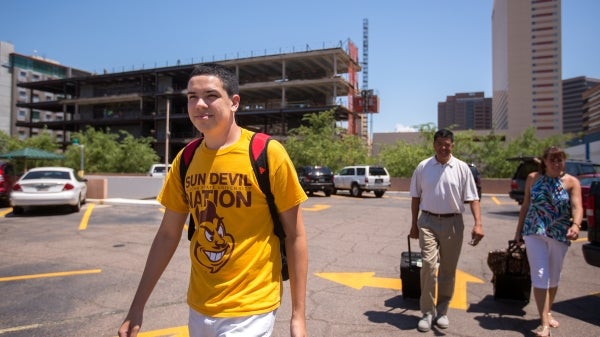 Joey Ramos-Mata walks toward his dorm.