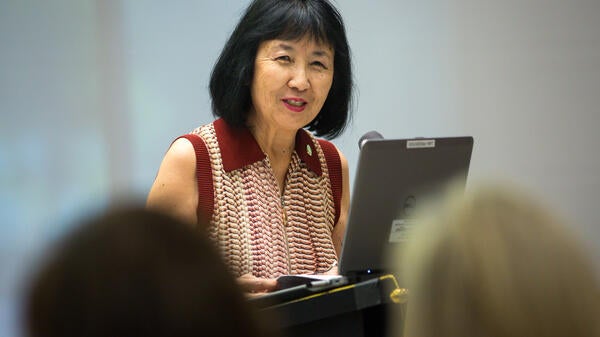 woman speaking at event