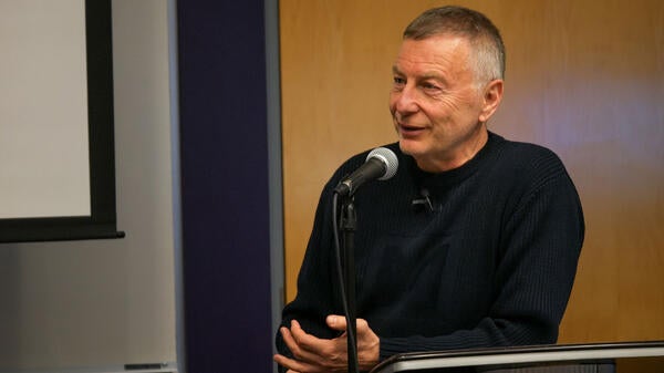 man speaking into microphone