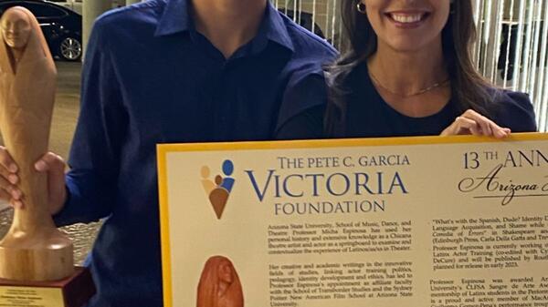 Professor Espinosa with her son at the awards ceremony on Sept. 14. Photo courtesy MIcha Espinosa.