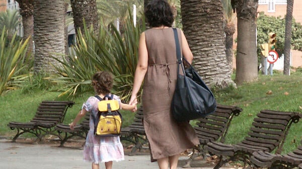 mother walking with child