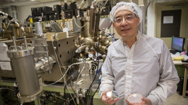 portrait of Yong Hang Zhang in a lab