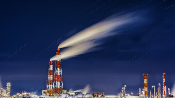 Emissions from two towers at a plant