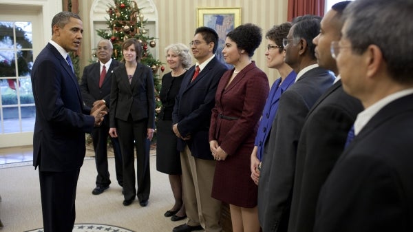 line of people in Oval Office with President Obama