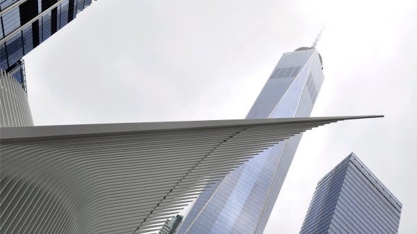 View looking up at high-rise buildings.