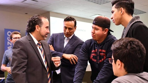 Enrique Vivoni speaking to a group