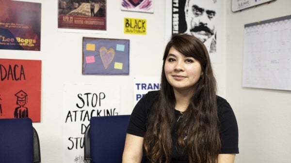 ASU alumna Reyna Montoya pictured in the Mesa office of her advocacy group, Aliento.