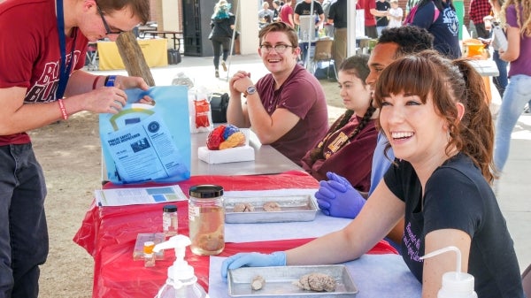 Isabel Strouse, ASU Department of Psychology student assists Red Mountain High School Students