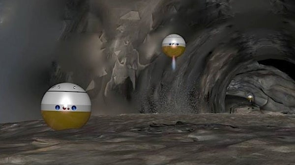 Robots exploring a lunar cave or lava tube