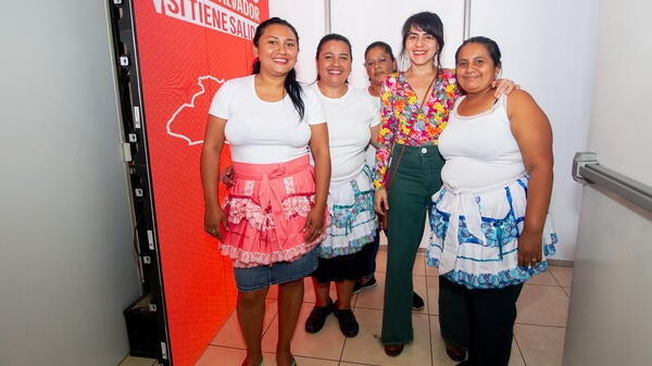 Members of an El Salvadoran theater group pose for a photo.