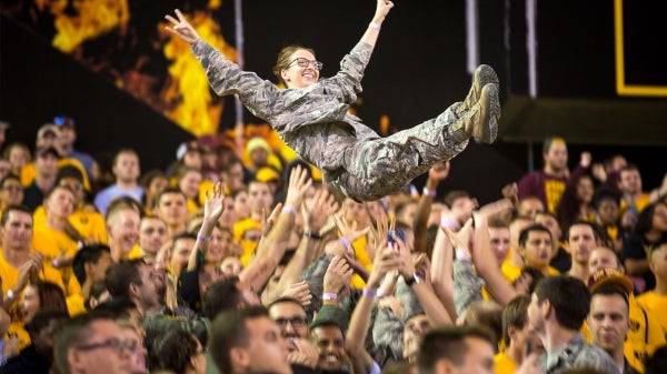 Soldier having fun at a football game