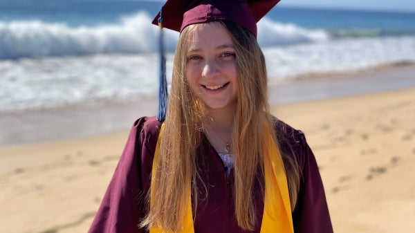 Courtesy image of graduating ASU student Sammie Harker in her graduation regalia.