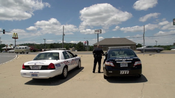 Two cop cars.